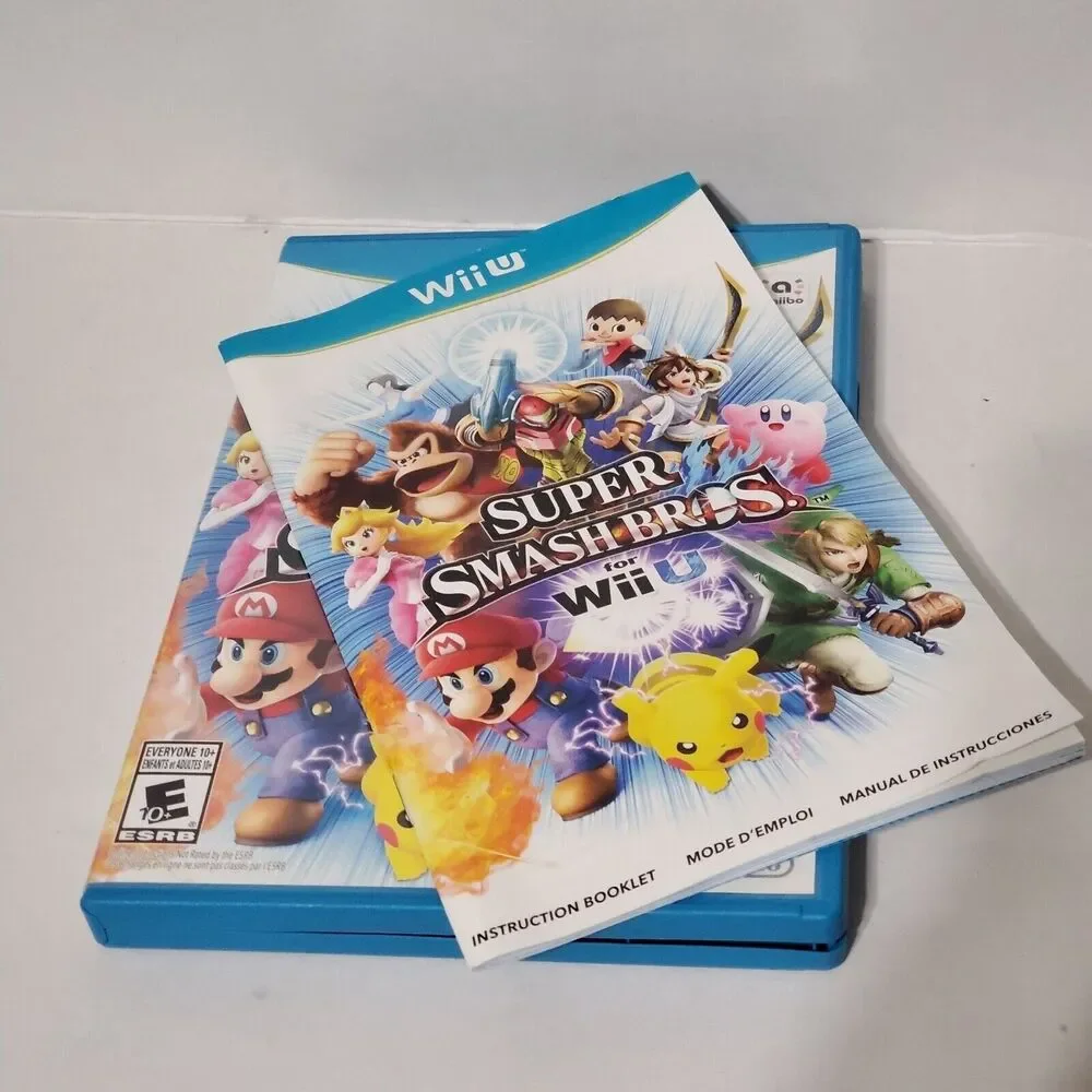 Nintendo Wii U 2x Game LOT Super Mario Bros U, Super Smash Bros Working Tested